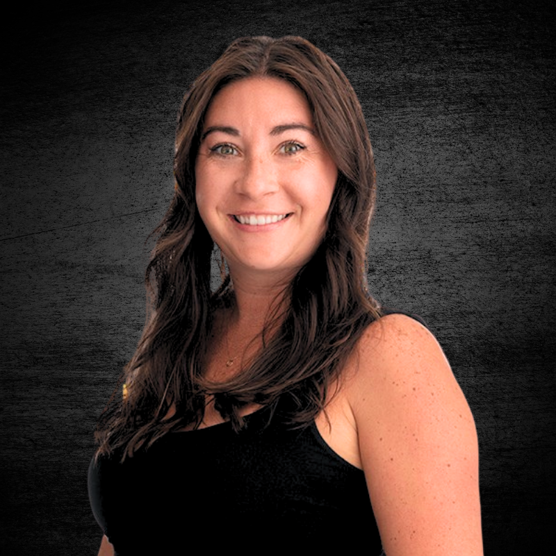 Smiling woman with long brown hair on a dark textured background